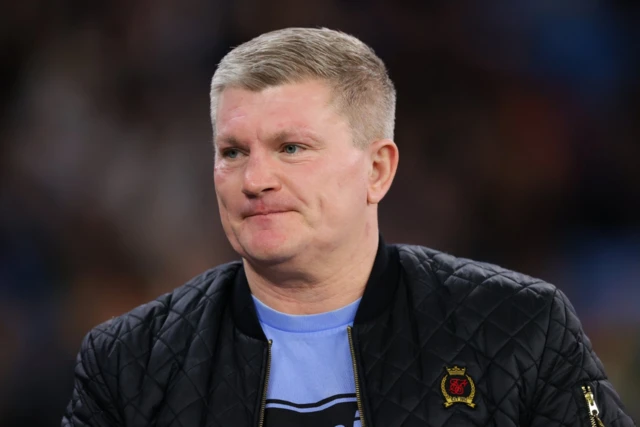 Ricky Hatton watching a football match