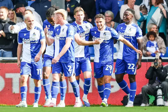Fabrizio Cavegn (second from right) celebrates with his Bristol Rovers team-mates