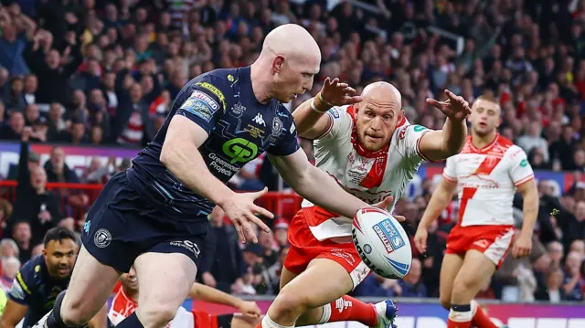 Wigan's Liam Farrell drops the ball