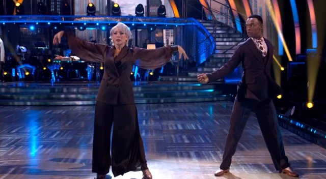Alex Kingston and partner performing on Strictly