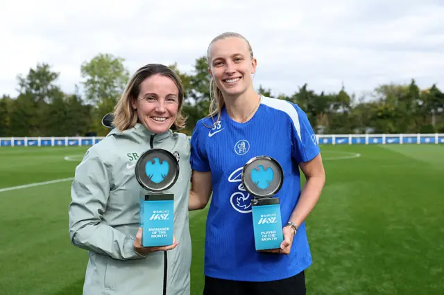Head Coach, Sonia Bompaster of Chelsea poses for the camera with her Barclays WSL Manager of the Month Award for September and Aggie Beever-Jones of Chelsea poses for the camera with her Barclays WSL Player of the Month Award