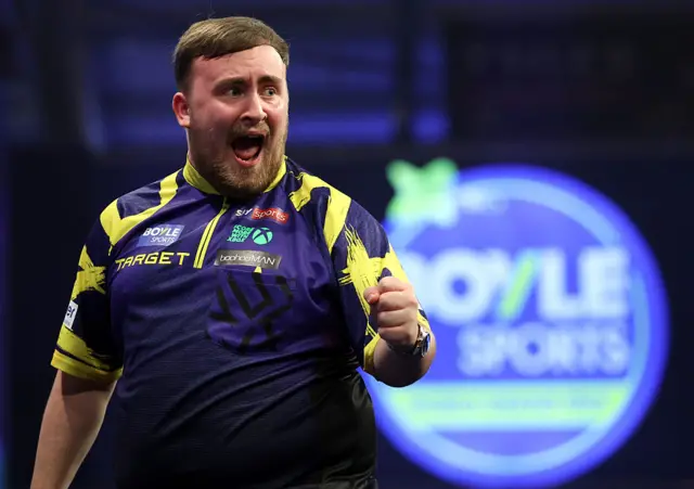 Luke Littler celebrates