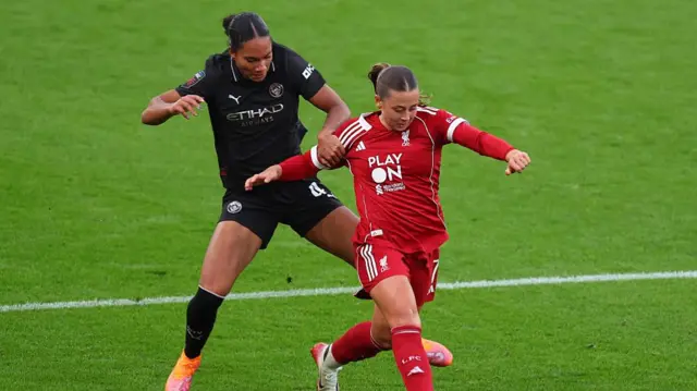 Liverpool v Man City action