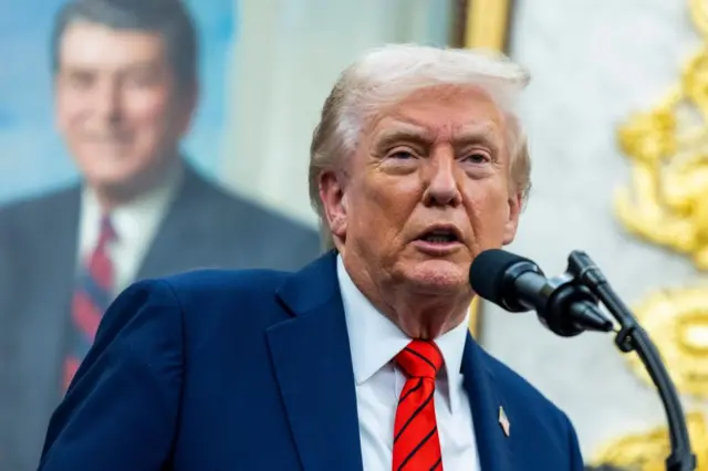 Donald Trump is seen speaking in the Oval Office