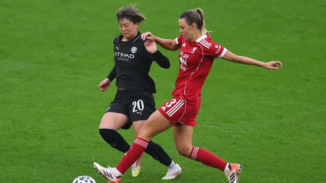 Liverpool v Man City action