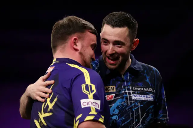 Luke Humphries hugs Luke Littler