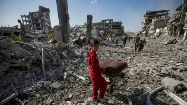Girl in ruined Gaza City street 10 Oct