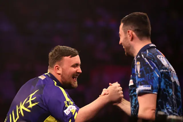 Luke Littler laughs with Luke Humphries