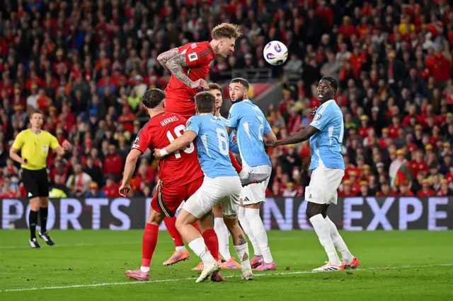 Joe Rodon heads a goal