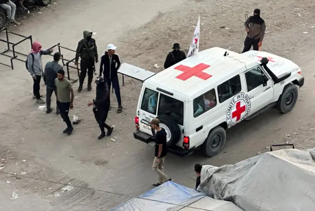 A white marked ICRC Red Cross van
