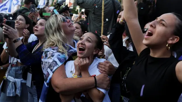 People react at Hostages Square as they await the return of Israeli hostages