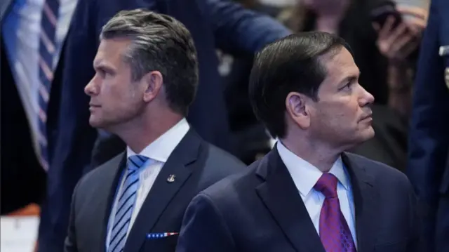 Pete Hegseth and Marco Rubio look around inside the main Knesset chamber