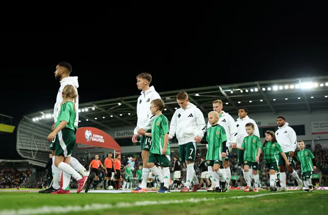 Players of Northern Ireland make their way out onto the pitch prior to the FIFA World Cup 2026 qualifier match between Northern Ireland and Germany