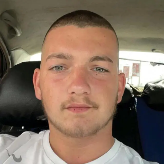 Image of Bar Abraham Kupershtein, one of the Israeli hostages who was taken by Hamas on 7 October while working at the Nova music festival. He wears a white t-shirt and looks into camera.