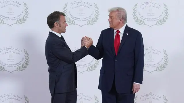 Macron and Trump shake hands