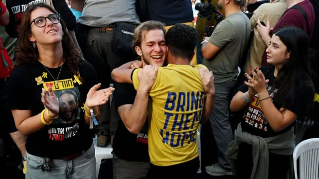 People celebrate as hostages are expected to be releaseed