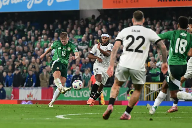Alistair McCann of Northern Ireland takes a shot during the FIFA World Cup 2026 qualifier match between Northern Ireland and Germany