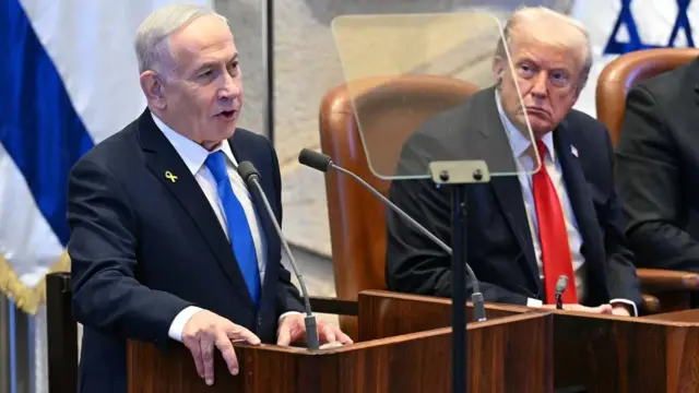 US President Donald Trump listens to Israeli Prime Minister Benjamin Netanyahu as he addresses the Knesset