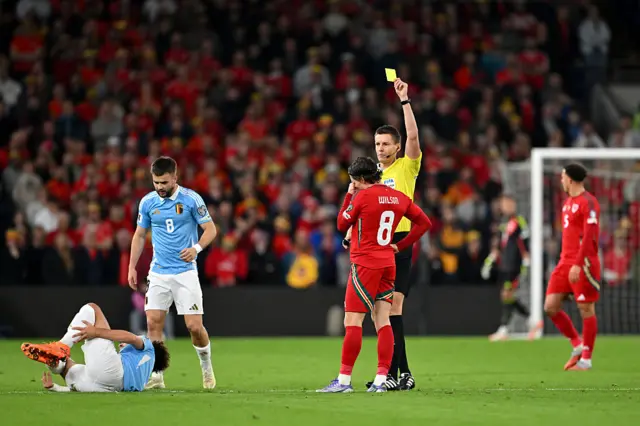 Wilson is shown a yellow card