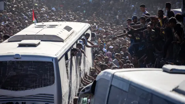 Palestinians welcome the freed prisoners upon their arrival in the Gaza Strip after their release from Israeli prisons under a swap agreement