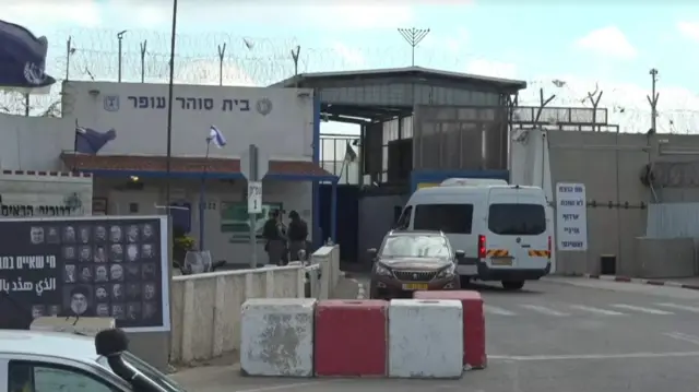 Vans entering through gate