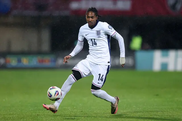 Djed Spence of England controls the ball