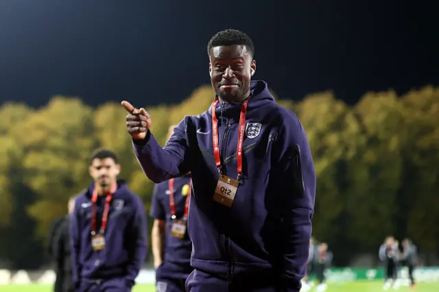 Marc Guehi of England inspects the pitch