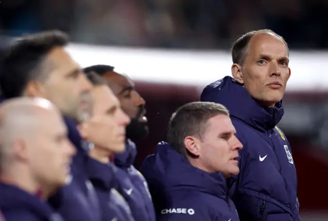 Thomas Tuchel, Head Coach of England, stands with his coaching staff