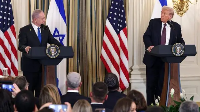 US President Donald Trump (R) and Israeli Prime Minister Benjamin Netanyahu hold a joint news conference in the State Dining Room at the White House