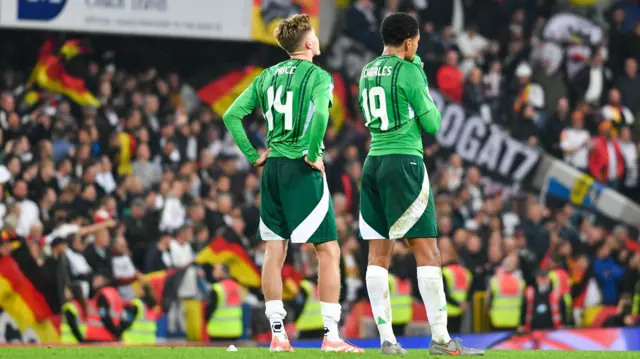 Isaac Price and Shea Charles at full-time as Northern Ireland lose to Germany