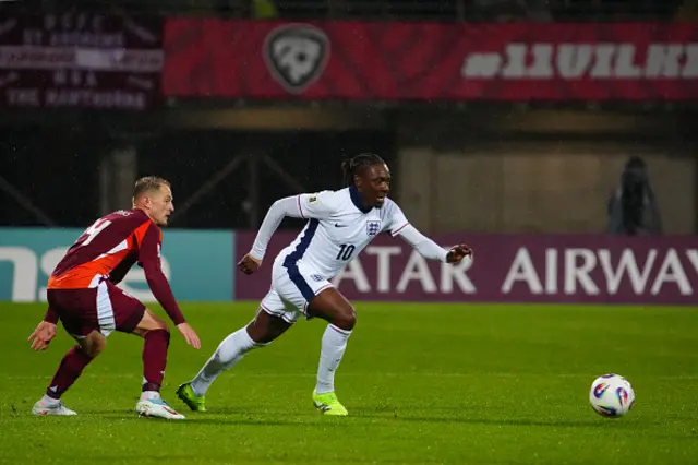 Eberechi Eze (R) and Latvia's midfielder Andrejs Ciganiks vie for the ball