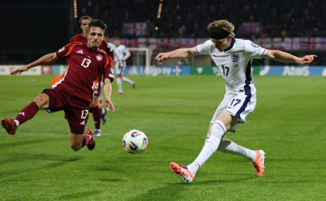 England's Anthony Gordon in action with Latvia's Raivis Jurkovskis