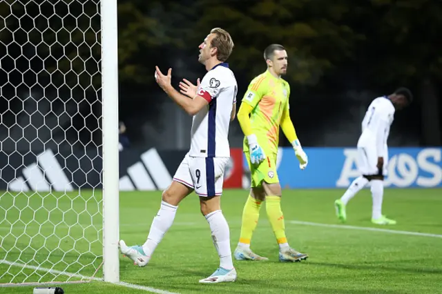 Harry Kane of England reacts after a missed chance