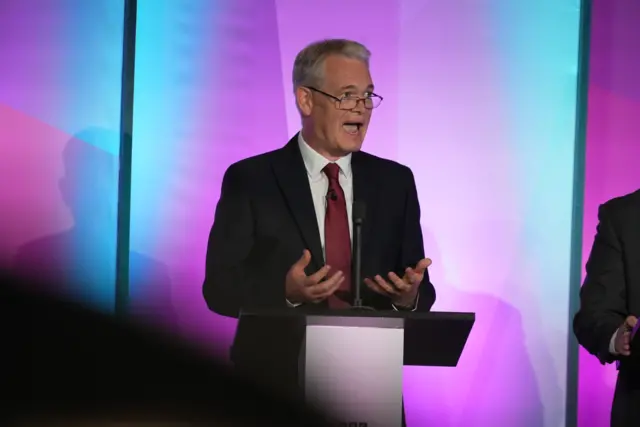 Richard Tunnicliffe - Labour candidate - stood at a podium wearing a red tie