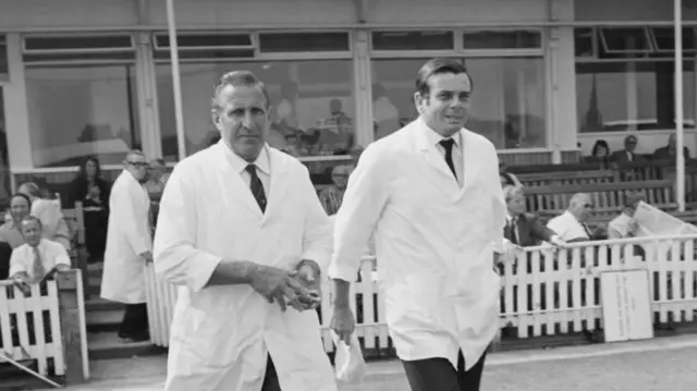 British cricket umpires Arthur Fagg (1915 - 1977, left) and Harold 'Dickie' Bird during a match between England and the West Indies in the Second Test at Edgbaston, UK, August 1973