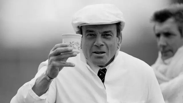 23 April 1985, The Parks - Cricket Friendly - Oxford University v Somerset - Umpire Harold Dickie Bird with a cup of tea.
