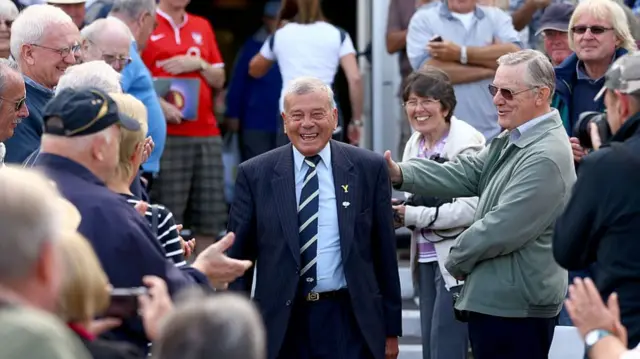 Former umpire Dickie Bird of Yorkshire is welcomed by the members after Yorkshire secure victory during the fourth day of the LV County Championship match between Nottinghamshire and Yorkshire at Trent Bridge on September 12, 2014 in Nottingham, England