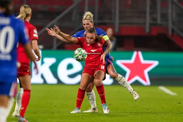 Millie Bright tackles a Twente player