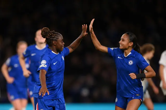 Sandy Baltimore of Chelsea celebrates with teammate Alyssa Thompson