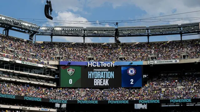 A big screen showing the words 'hydration break' during Chelsea's Club World Cup game against Fluminense