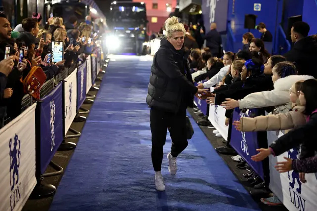 Millie Bright of Chelsea interacts with the fans