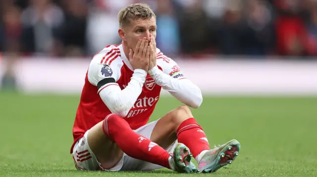 Arsenal's Martin Odegaard sustains an injury on the pitch