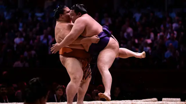 Mitakeumi and Churanoumi battle during day two of The Grand Sumo Tournament at Royal Albert Hall on October 16, 2025 in London, England.