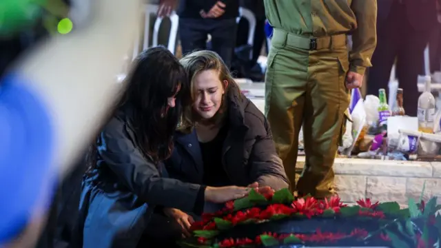 dina Perez and Shira Perez attend the funeral of their brother, Israeli soldier Daniel Shimon Perez, who was killed during the deadly October 7, 2023 attack by Hamas