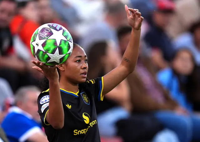 Jayde Riviere of Manchester United looks to throw the ball
