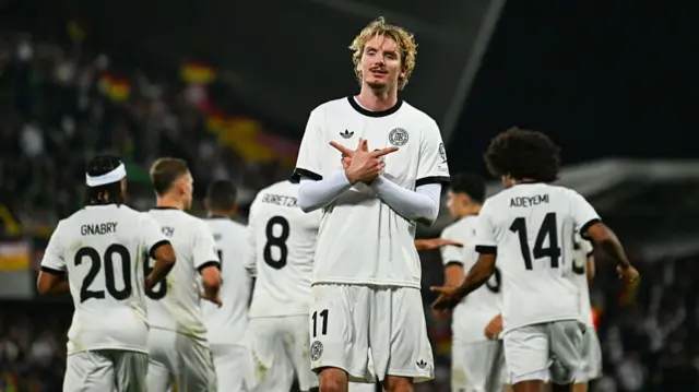 Nick Woltemade celebrates after scoring for Germany