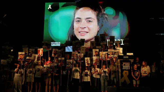 An image of Inbar Hayman at a rally in Tel Aviv last month