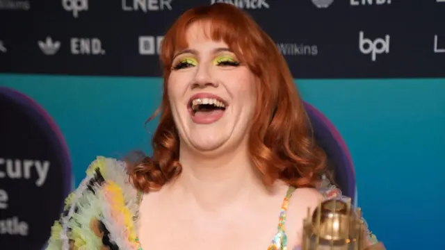 CMAT laughs on the Mercury Prize red carpet