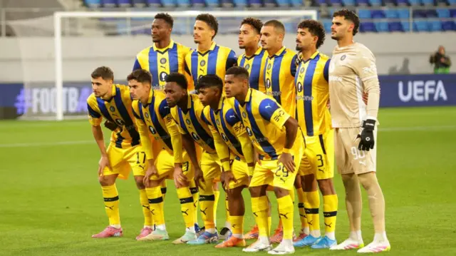 Players of Maccabi pose for a team photo ahead of the UEFA Europa League league phase match between Maccabi Tel Aviv and GNK Dinamo Zagreb, in Backa Topola, Serbia