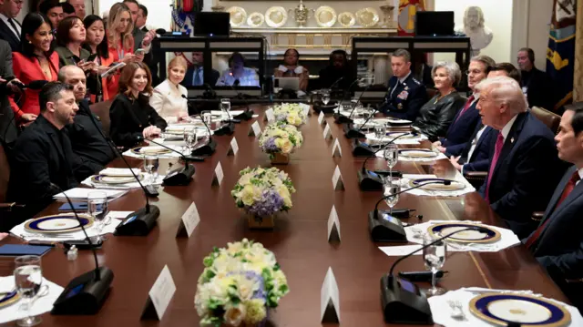 US President Donald Trump meets with Ukraine's President Volodymyr Zelensky over lunch in the Cabinet Room of the White House